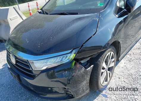 2021 Honda Odyssey Touring z USA, uszkodzony, nr VIN 5FNRL6H84MB027396